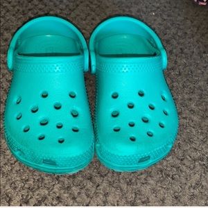 Turquoise toddler Crocs size 7
